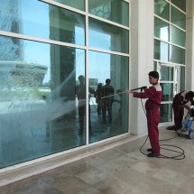 washing and cleaning the facade of the building شستشو و نظافت نمای ساختمان